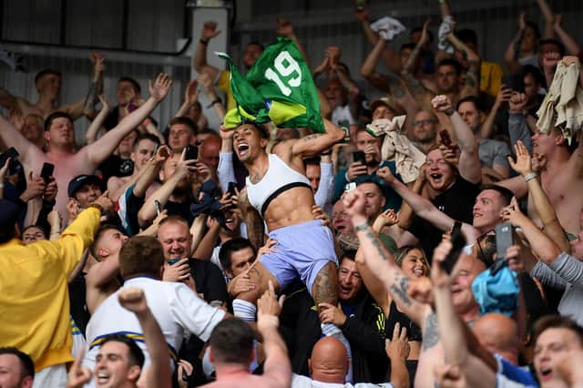 CELEBRATE: Raphinha leads the celebrations as Leeds United secure Premier League survival (Photo by Alex Davidson/Getty Images)