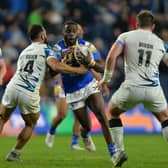 Leeds Rhinos' Muizz Mustapha takes on Eloi Pelissier and Andrew Dixon of Toulouse. Picture: Bruce Rollinson.