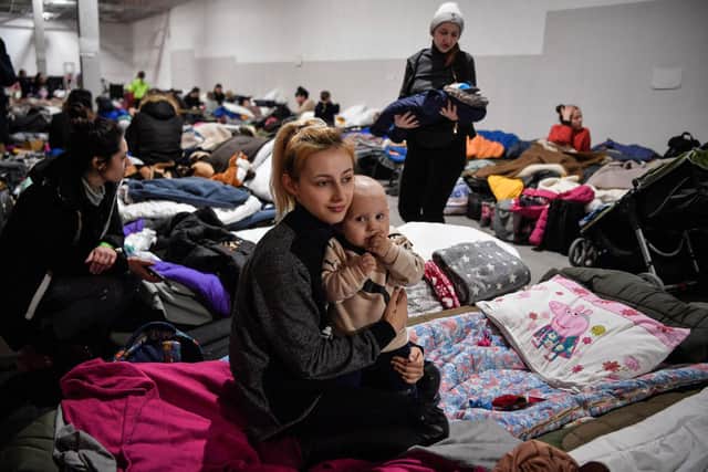 Ukrainian refugees in a temporary shelter in Poland last month. Picture: Louisa Gouliamaki/AFP via Getty Images