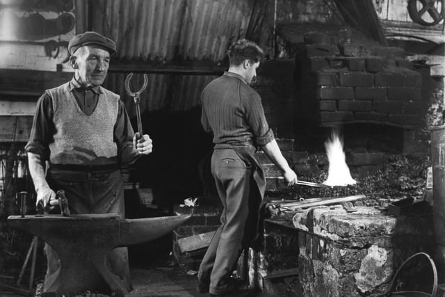 Inside Wetherby's York Road Forge in February 1962. Pictured is Fred Garten (left) and Stanley Thompson.