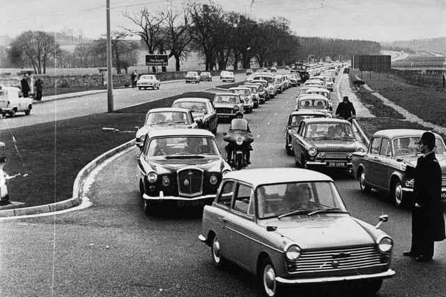 A queue on the A1 south of Wetherby at the junction with the Leeds Road in April 1966 which carried a line of cars right back to Collingham.