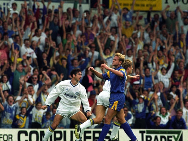 Lee Chapman celebrates after scoring.