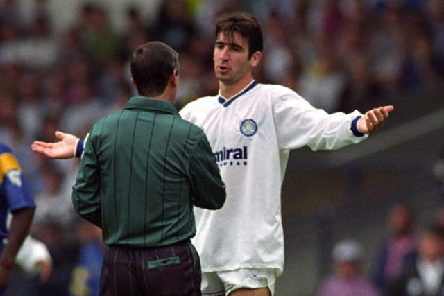 Eric Cantona makes his point to the referee.