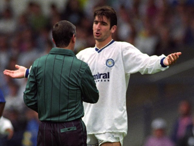 Eric Cantona makes his point to the referee.