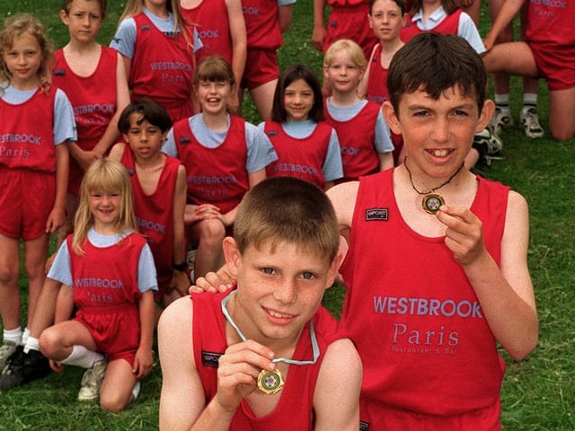 Have you spotted this familiar face? James Milner is pictured with teammates from Westbrook Lane Primary U-11s running team.