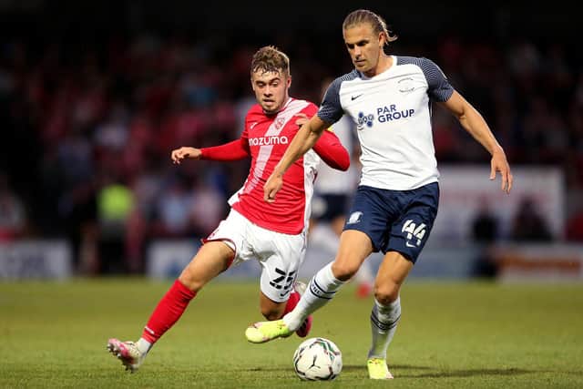 INTERNATIONAL PROMOTION: For Leeds United's Alfie McCalmont, left, pictured in action for loan side Morecambe in last August's Carabao Cup clash against Preston North End. Photo by Charlotte Tattersall/Getty Images.