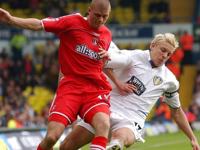 Alan Smith tackles Charlton Athletic's Paul Konchesky.