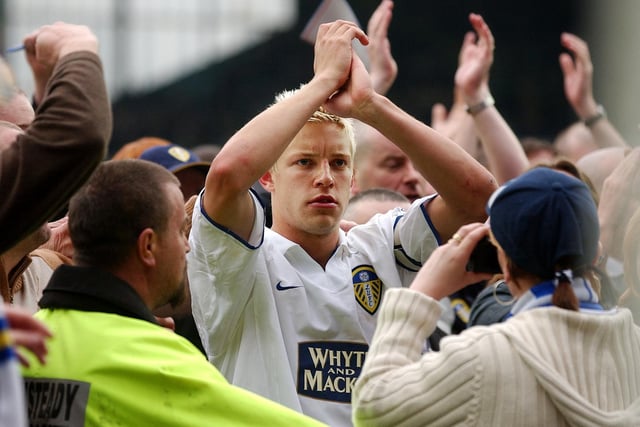 Alan Smith applauds the fans at full-time.