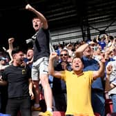 PASSION: Leeds United supporters celebrate Premier League survival (Photo by Alex Davidson/Getty Images)