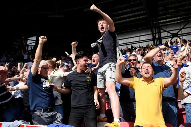 PASSION: Leeds United supporters celebrate Premier League survival (Photo by Alex Davidson/Getty Images)