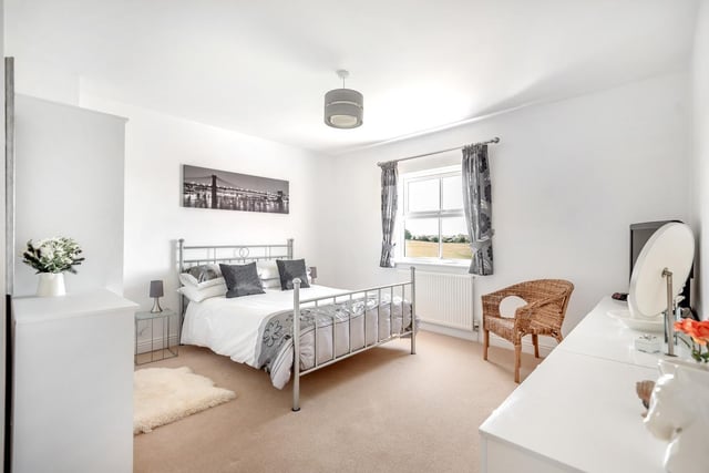 From the landing area stairs lead up to the second floor having two further substantial bedrooms being serviced by a modern en-suite shower room and a useful store cupboard located on the landing area.