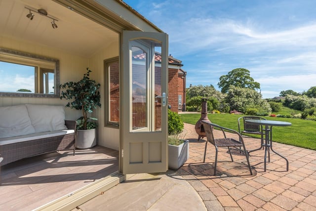 To the immediate rear of the property is a paved patio which is ideal for outdoor entertaining and alfresco dining.