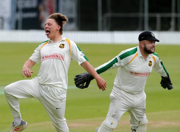 Pudsey St Lawrence's Charlie Parker celebrates taking a second wicket in his first over by getting New Farnley's Lee Goddard caught for 0 by Chris Marsden. Picture: Steve Riding.