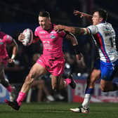 Leeds Rhinos' Harry Newman gets away from Wakefield Trinity's Jai Whitbread. The Rhinos will be hugely boosted by his return from injury says Gary Hetherington. Picture: Jonathan Gawthorpe.