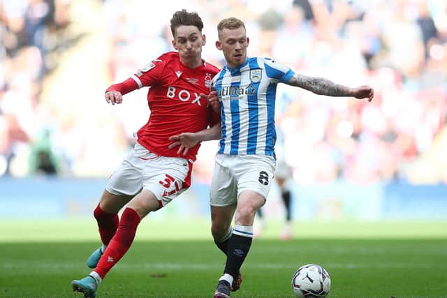 Lewis O'Brien battles James Garner during Huddersfield Town's Championship Play-Off Final defeat to Nottingham Forest. Pic: Christopher Lee.