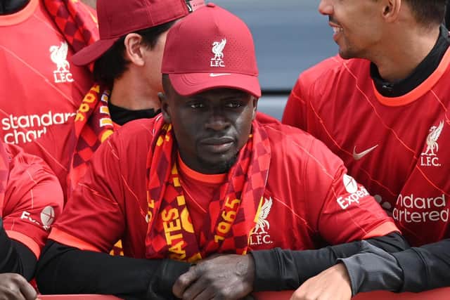 PARADE: Sadio Mane atop Liverpool's end-of-season open top bus tour of the city (Photo by OLI SCARFF/AFP via Getty Images)