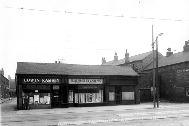 Balm Road in April 1959. on the left is Edwin Ramsey, electrical and radio engineer. and in the centre is a bakers and confectioners run by Harry Midgley and Sons.