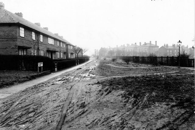 A view looking west along East Grange Drive from the junction with East Grange Garth in February 1953.