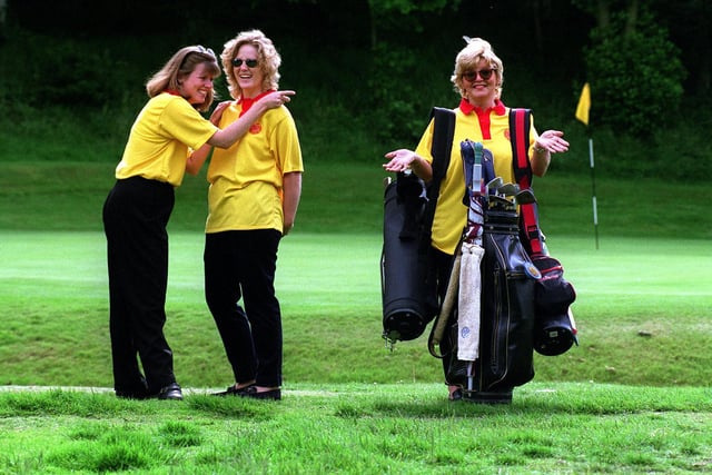 Nurses from the LGI's cardiology ward 7 try their hand at caddying during a tournament at Headingley Golf Course to raise money for the Take Heart charity. Pictured, from left, are Kathryn Horgan, Vicki Dodsworth and Debbie Clegg.