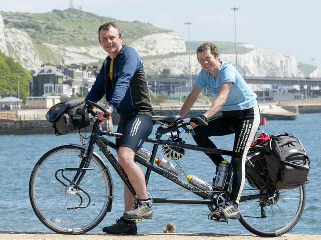 May 2004 and cancer sufferer Jane Tomlinson and brother Luke Goward arrive in Dover during their Rome to Leeds bike ride to raise money for charity. To date the duo had raised more than £90,000 for charity and were just £10,000 short of their £100,000 target.