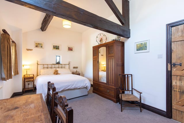 Open ceiling vaults in this double bedroom within the property.