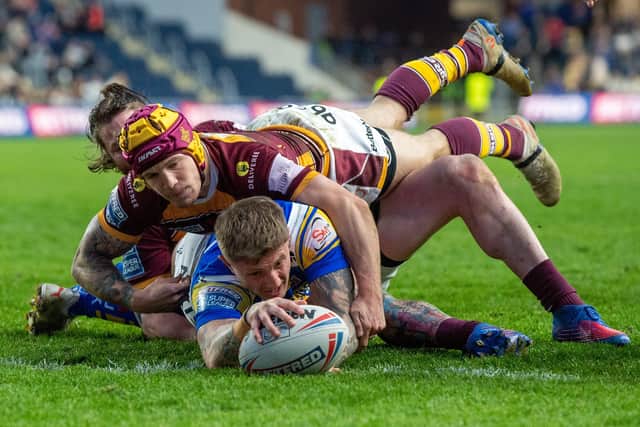 Leeds Rhinos centre Liam Sutcliffe in recent tryscoring action against Huddersfield Giants. Picture: Bruce Rollinson.