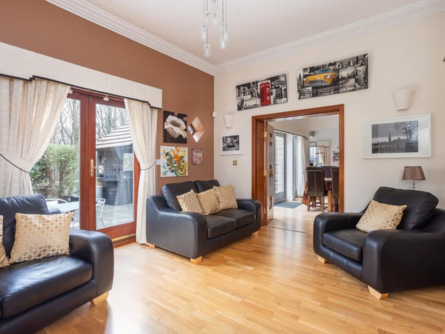 At ground level, there is a formal sitting room and a coffee room, both excellent rooms for entertaining, while an open plan sitting/dining room on the far side of the house is a wonderful family space with double height ceiling.