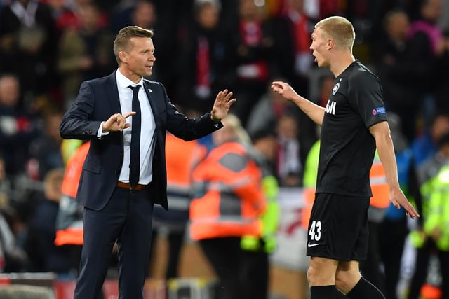 Kristensen takes instructions from RB Salzburg boss during a 4-3 Champions League defeat to Liverpool at Anfield.