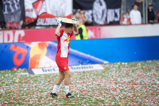 Kristensen celebrates with the Bundesliga trophy after scoring three goals and making five assists across 31 league appearances during the 2020/2021 season.