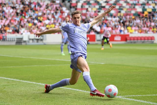 Diego Llorente stretches to keep the ball in during Leeds United's 3-1 final day victory at the Brentford Community Stadium. Pic: Alex Davidson.