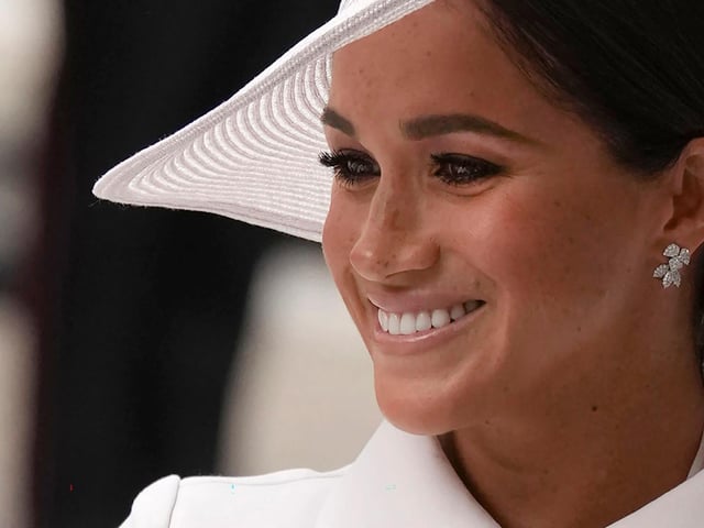 Meghan, the Duke and Duchess of Sussex, arrives for the National Service of Thanksgiving for The Queen's reign at Saint Paul's Cathedral.