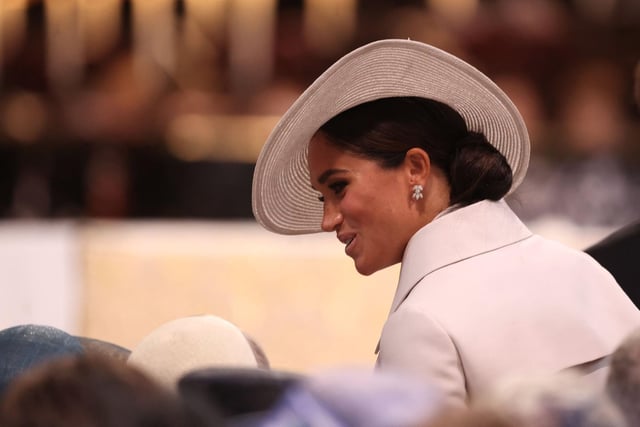 Meghan, the Duke and Duchess of Sussex, takes her seat at Saint Paul's Cathedral for the National Service of Thanksgiving for The Queen's reign.