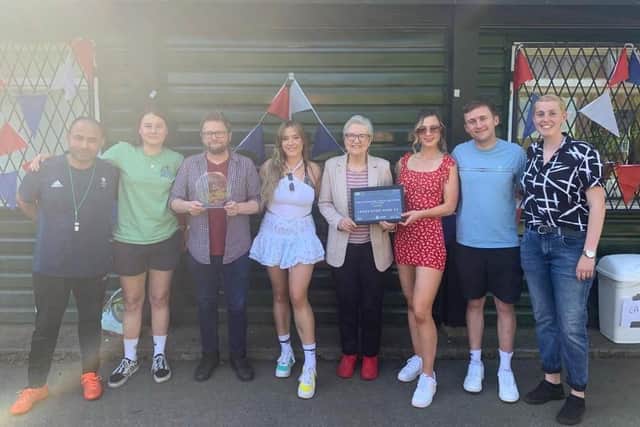 Izzy Lowen (right) and Adel Chermiti (left) celebrate the club's significant achievement for Under 18s Participation, recognised by Leeds Sports Awards, with Headingley Councillor Al Garthwaite. Pic: Izzy Lowen.