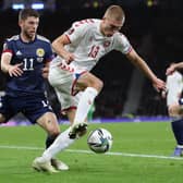 Leeds United target and Denmark international Rasmus Kristensen, centre, pictured in November's World Cup against Scotland at Hampden Park. 
Photo by Ian MacNicol/Getty Images.
