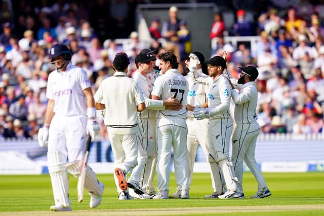 New Zealand players celebrate after taking the wicket of England's Joe Root at Lord's  Picture: Adam Davy/PA