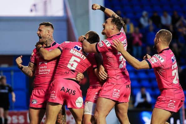 Ash Handley celebrates with Zak Hardaker, James Donaldson and Jarrod O’Connor after scoring in Rhinos' 40-4 demolition of Warrington. Picture by Alex Whitehead/SWpix.com.