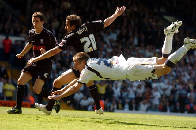 Richard Creswell puts Leeds United ahead with a diving header.