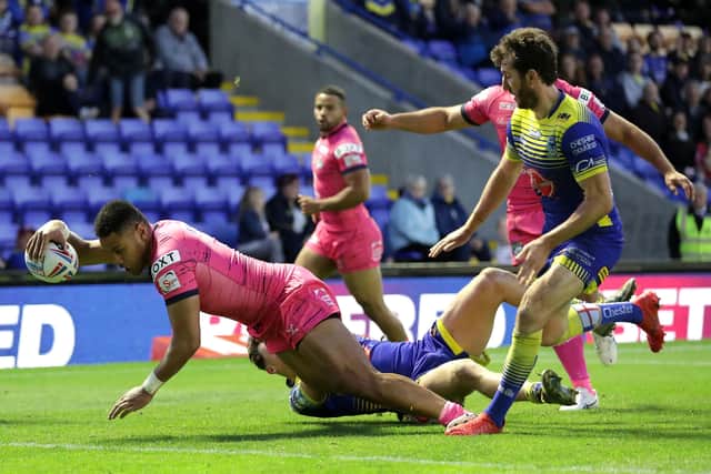 Leeds Rhinos' David Fusitu'a scores his side's seventh try against Warrington Wolves. Picture: Richard Sellers/PA Wire.
