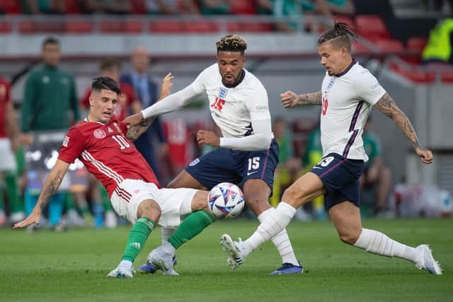 FRUSTRATION: Leeds United's England midfielder Kalvin Phillips, right, and Three Lions team mate Reece James challenge Hungary's match winner Dominik Szoboszlai in Saturday's defeat in Budapest. Photo by Visionhaus/Getty Images.