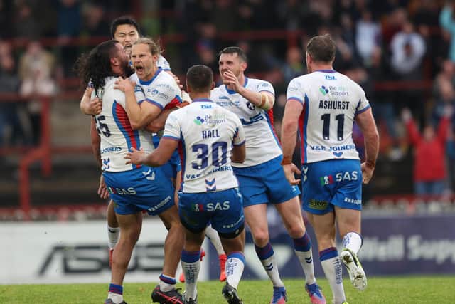 Wakefield Trinity celebrate Jacob Miller's winning drop goal. (Picture: SWPix.com)