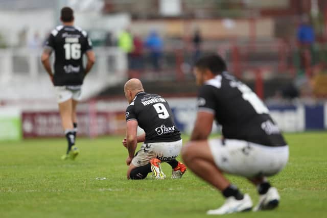 Hull FC players appear dejected after going down in golden point. (Picture: SWPix.com)