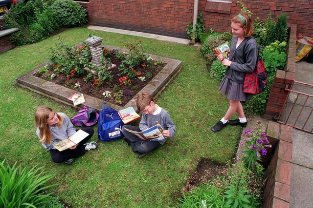 Pupils from White Laith Primary in Whinmoor enjoy the school's 'Heather Garden'. Pictured, from left, are Natalie McLean, Nicholas Wilson and Sarah Bastow.