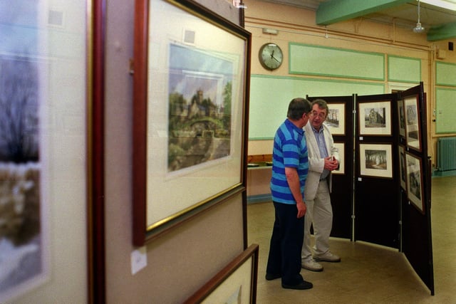 TV personality Ian McCaskill chats with artist Alan Bamford at an exhibition of his work held at Centenary House in Leeds. The show, opened by Ian and promoted by the Rotary Club of Cross Gates, was held to raise money for the Multiple Sclerosis Therapy Centre at Rawdon.