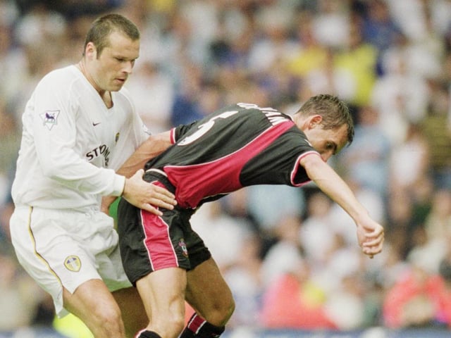 Southampton's Claus Lundekvam shields the ball from Mark Viduka.