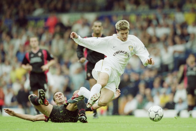 Harry Kewell is brought down by Southampton's Claus Lundekvam.