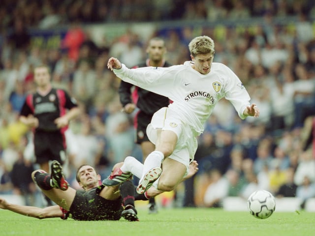 Harry Kewell is brought down by Southampton's Claus Lundekvam.