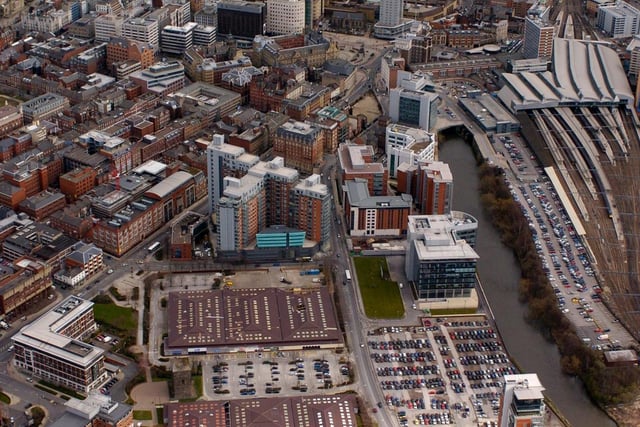 A view looking down over tyhe city centre, with views along Wellington Street, Leeds Inner Ring Road, Leeds City Station and the Bridgewater development.
