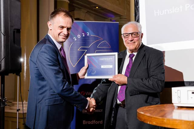 Vahe Aghanian (right) receives his award from Tom Bridge, Operations Director of First West Yorkshire.