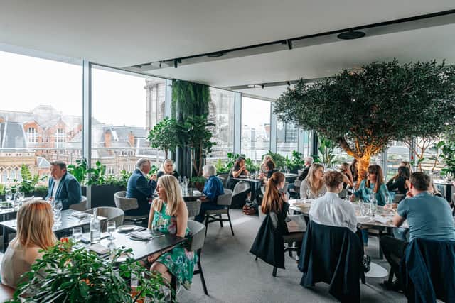 The transformation has brought overgrown foliage and vibrant spring florals into the restaurant
