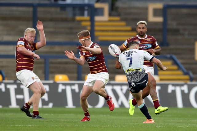Rhinos captain Luke Gale landed a golden-point drop goal to beat Huddersfield in 2020. Picture by Martin Rickett/PA.